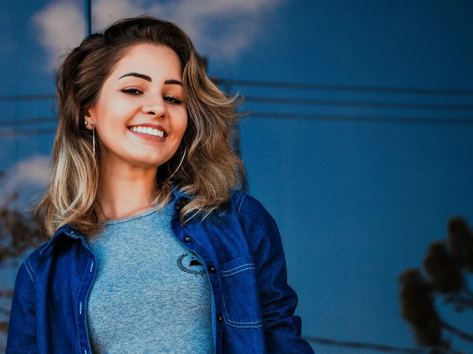 Woman with a bright, confident smile